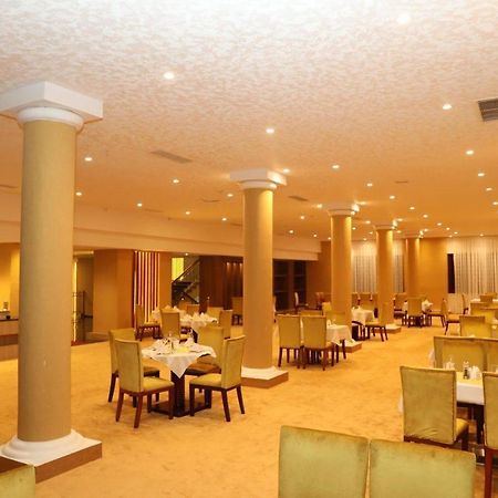 Kenenisa Hotel Addis Ababa Bagian luar foto