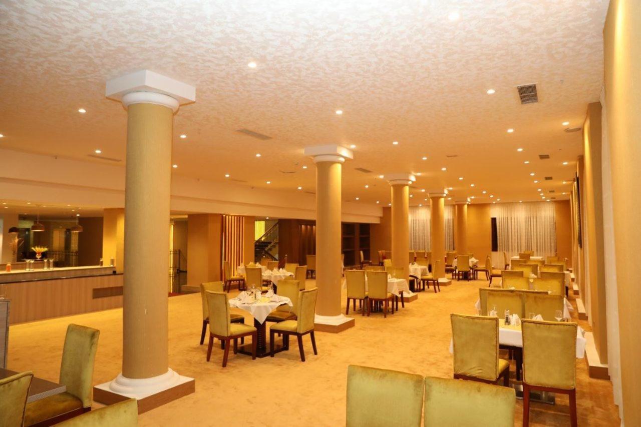 Kenenisa Hotel Addis Ababa Bagian luar foto