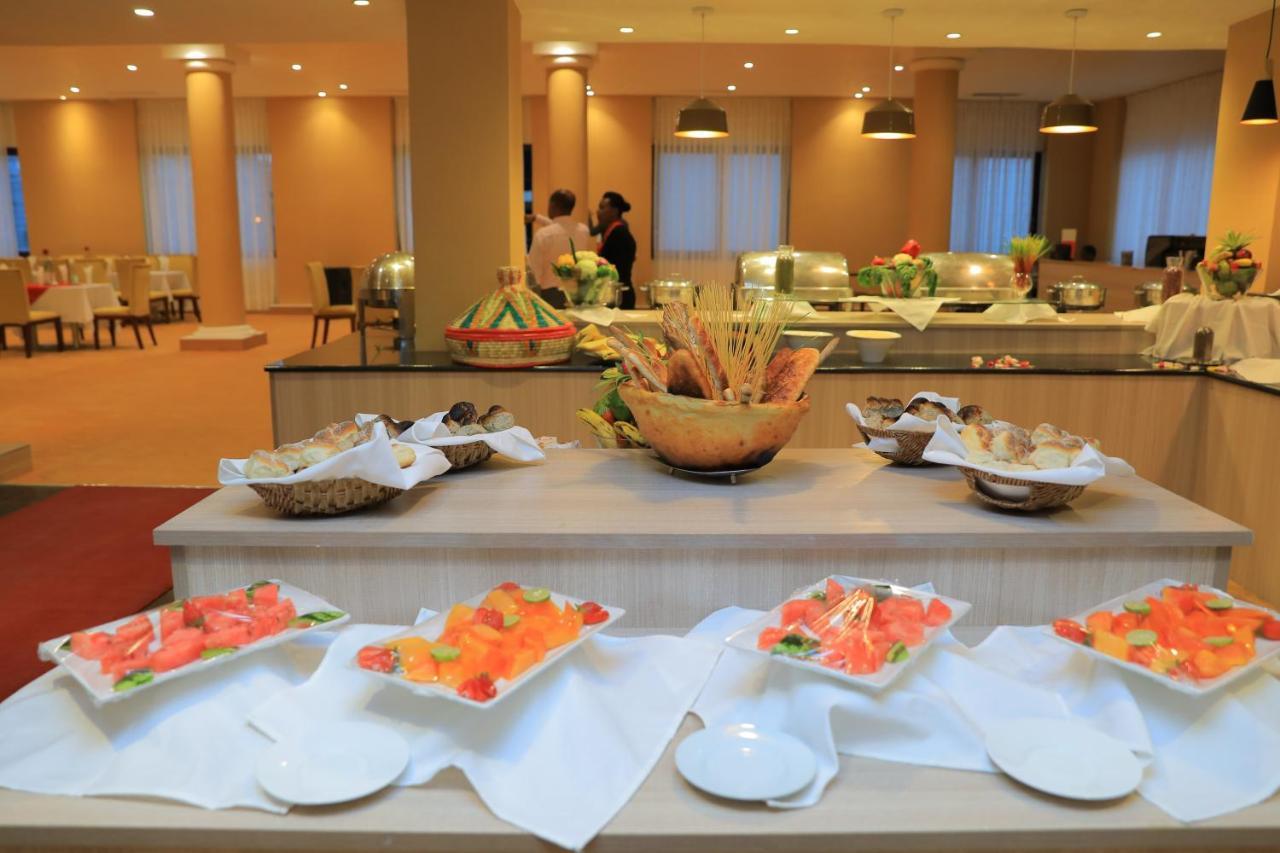 Kenenisa Hotel Addis Ababa Bagian luar foto